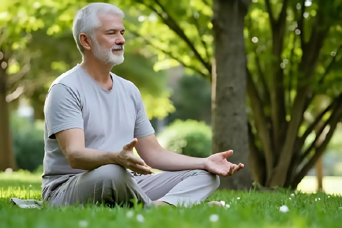 Person meditating in peaceful garden setting